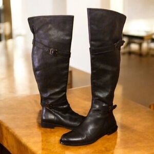 Black Italian leather boots.
